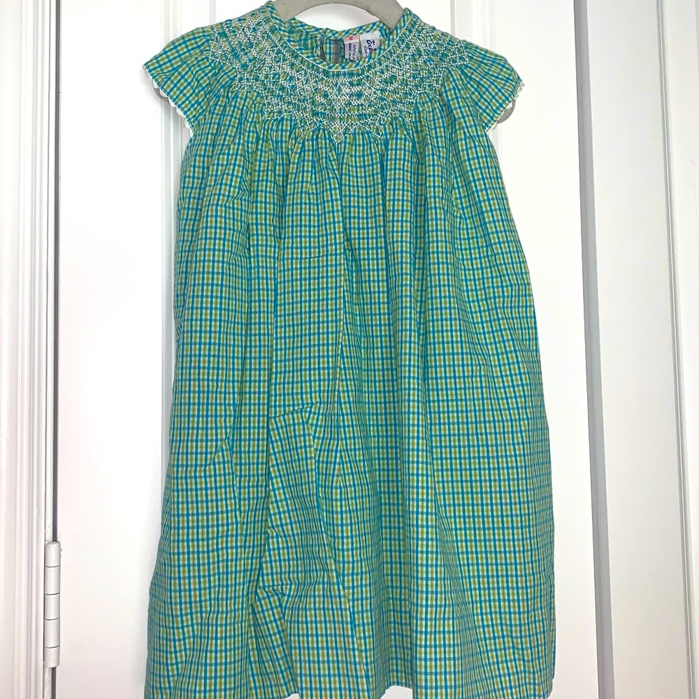 Orient expressed. Girls hand smocked dress sz 2